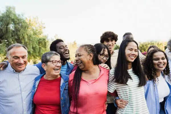 Group of diverse people laughing together.