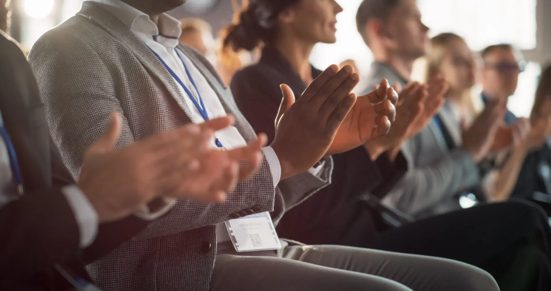 Close Up on Hands of Audience of People Applauding in Concert Hall During Business Forum Presentation. Technology Summit Auditorium Room With Corporate Delegates. Excited Entrepreneurs Clapping.